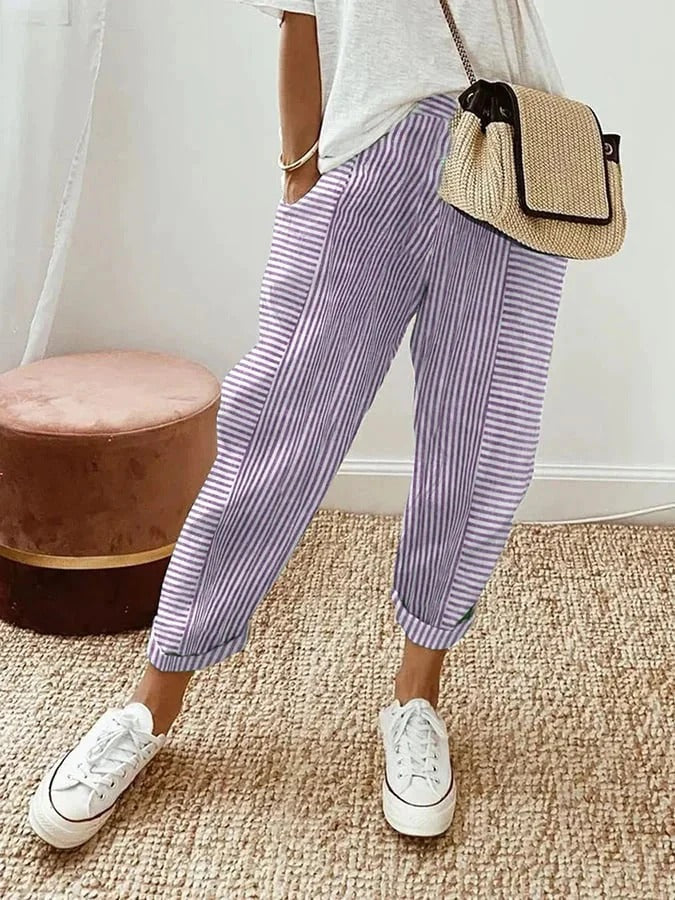 Women's relaxed striped lightweight summer trousers in six colourways, shown for womenswear styling