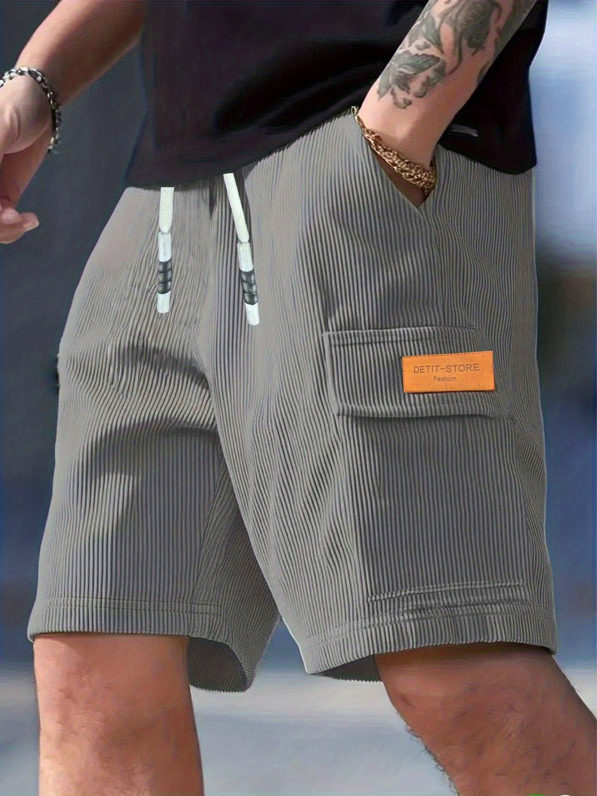 Men's textured drawstring cargo shorts in black, apricot and grey