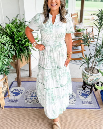 Women's toile print tiered maxi dress with a smocked waist and soft V-neckline