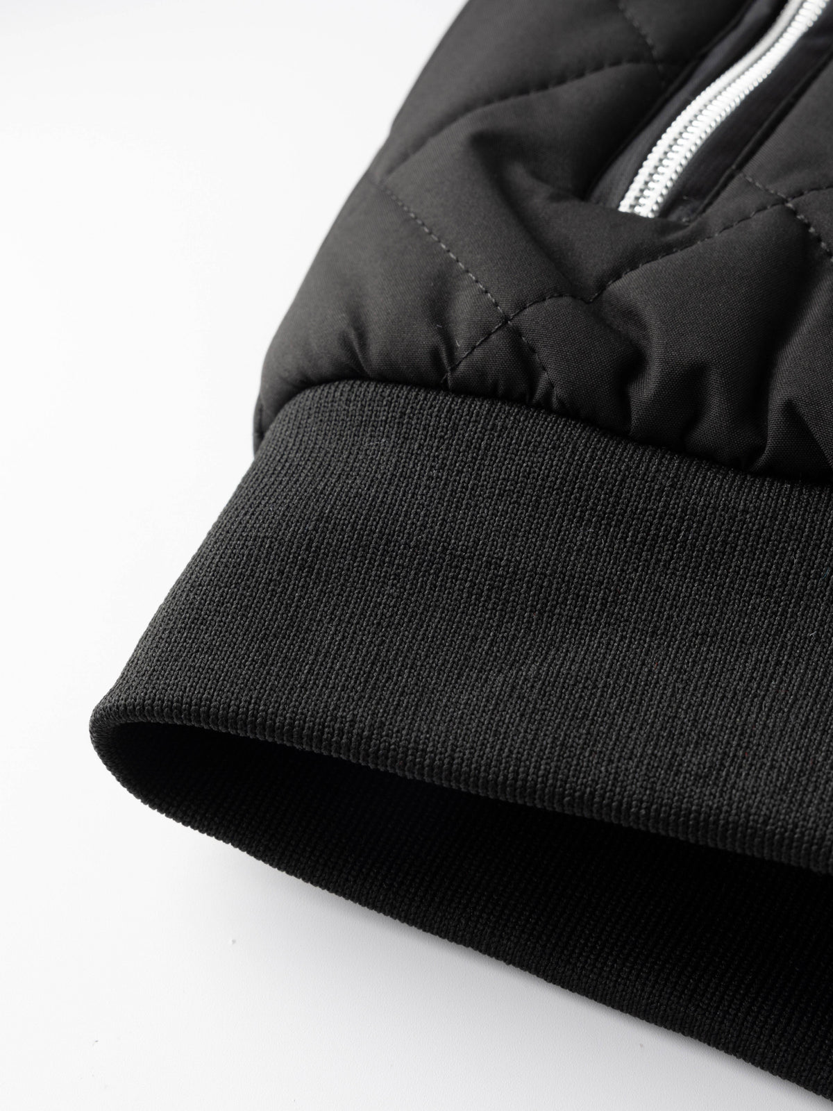 Kessoro unisex quilted bomber jacket in black with a full-length zip
