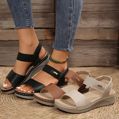 Women's cushioned open toe sandal in brown, black and beige with a supportive sole