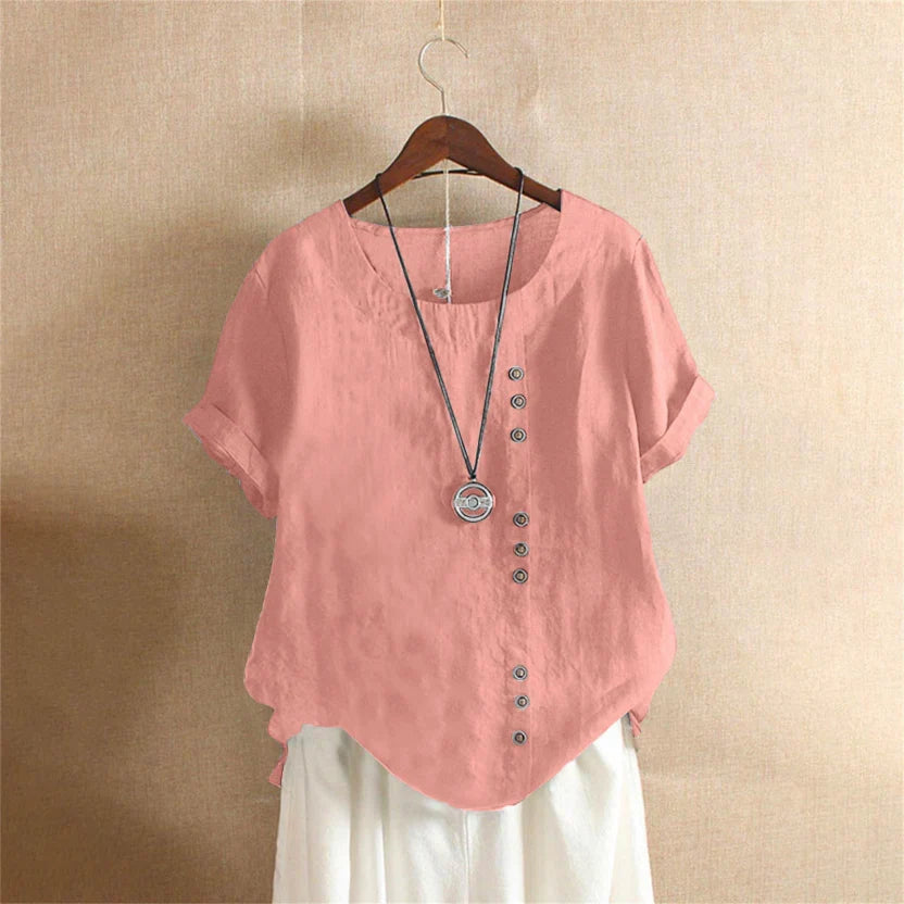 Women's asymmetrical button detail lightweight summer blouse in nine colourways, shown for womenswear styling