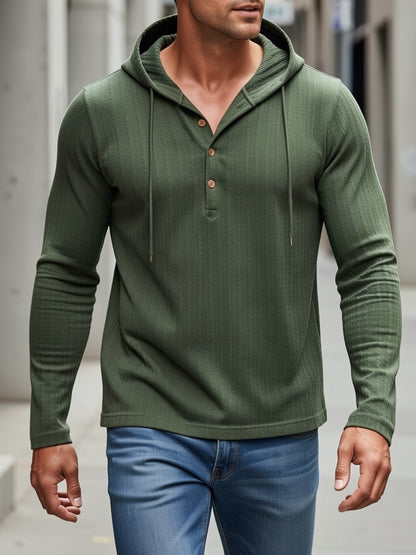 Men's textured hooded button-placket henley shirt in dark green, styled view