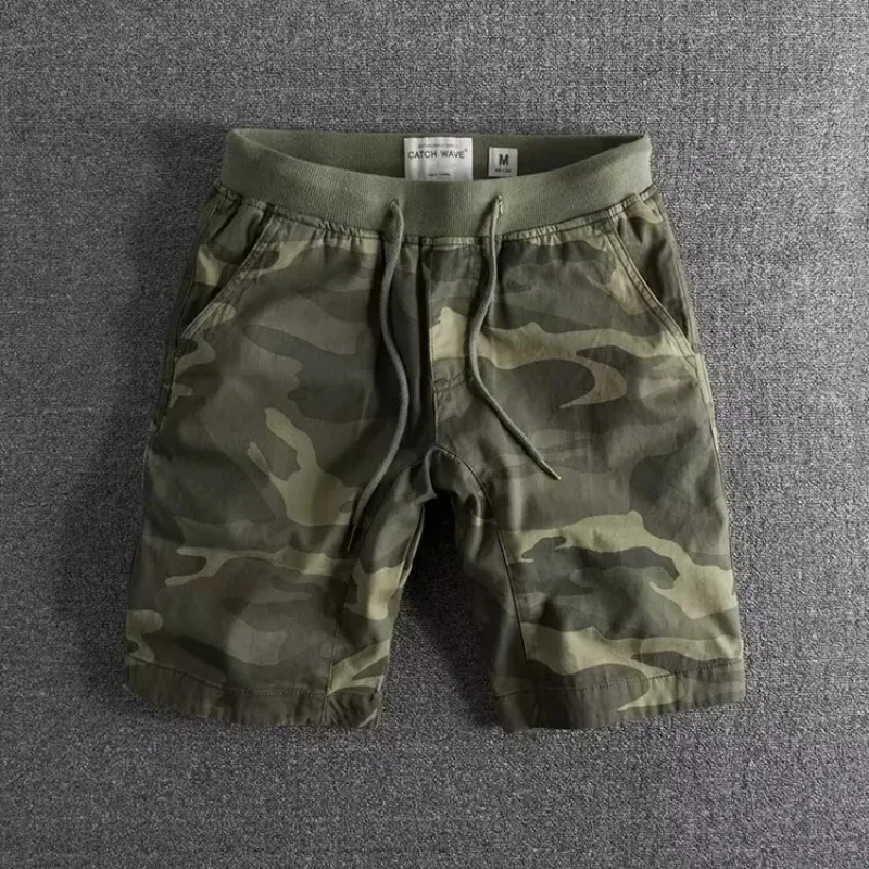 Kessoro Men's Camo Print Drawstring Relaxed Shorts in dark forest and military green — styled on model