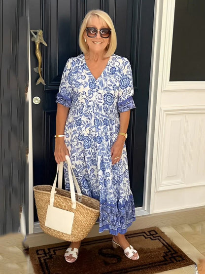Women's graceful V-neck floral print dress in blue, brown, pink, violet and green