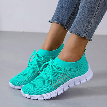 Kessoro Women's Lightweight Cushioned Everyday Sneakers in turquoise, pink, red and other colourways — front view