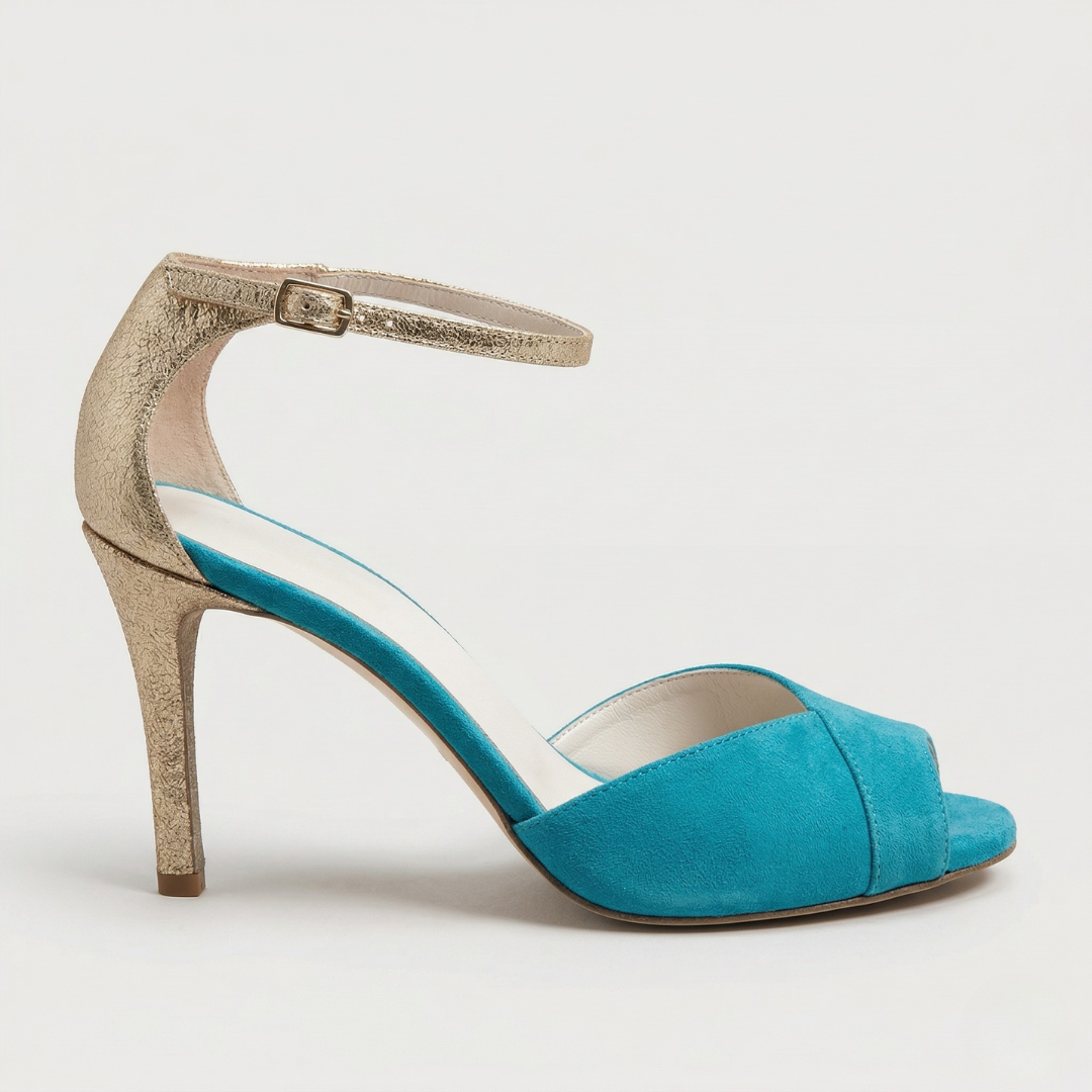 Women's teal suede strap heels with gold accents