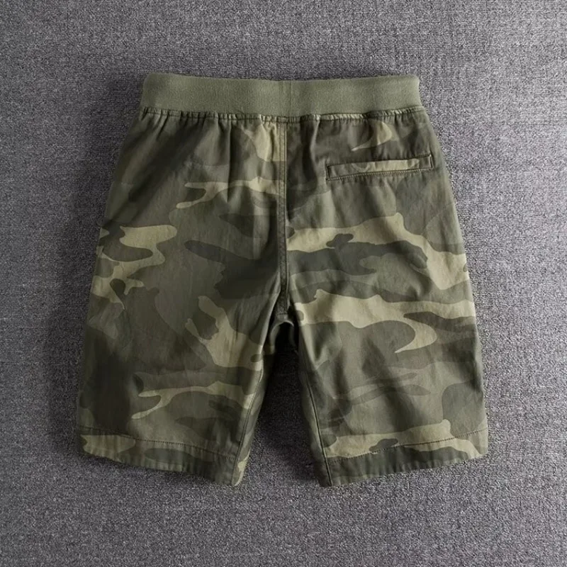 Kessoro Men's Camo Print Drawstring Relaxed Shorts in dark forest and military green — side view