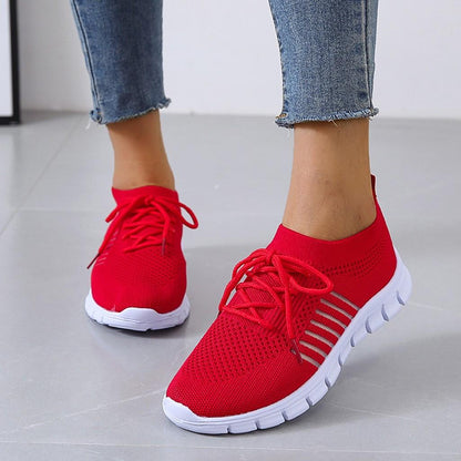 Kessoro Women's Lightweight Cushioned Everyday Sneakers in turquoise, pink, red and other colourways — side view