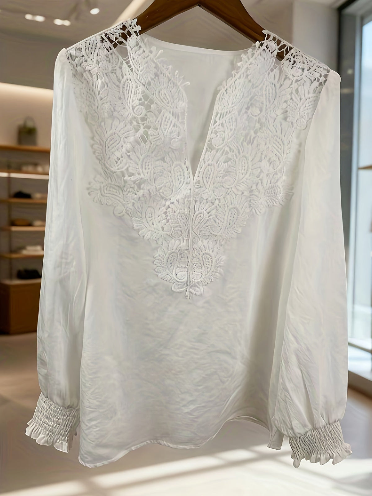 Kessoro women's embroidered V-neck lantern-sleeve blouse in white and light blue – view 6