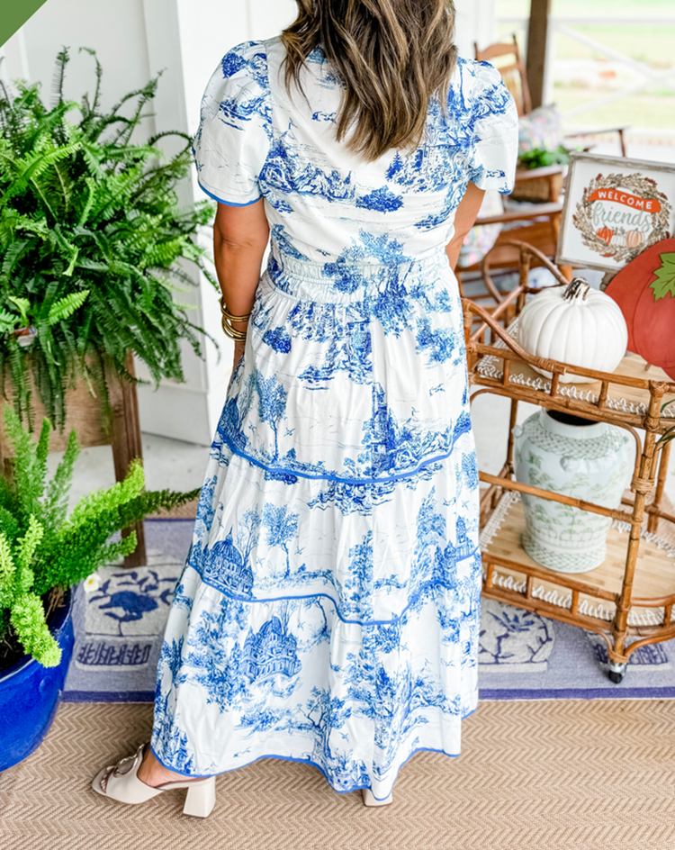 Women's toile print tiered maxi dress with a smocked waist and soft V-neckline