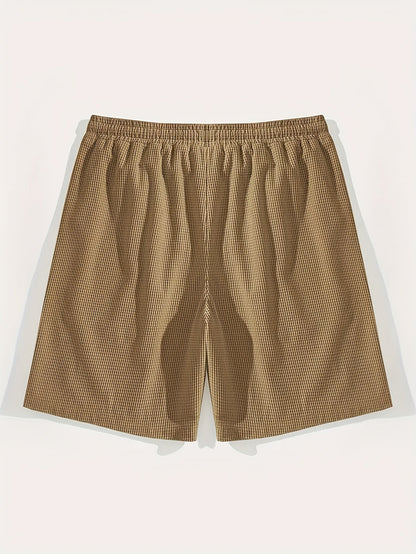 Kessoro Men's Textured Drawstring Relaxed Casual Shorts in black, khaki, beige and white — detail of the fabric and finish