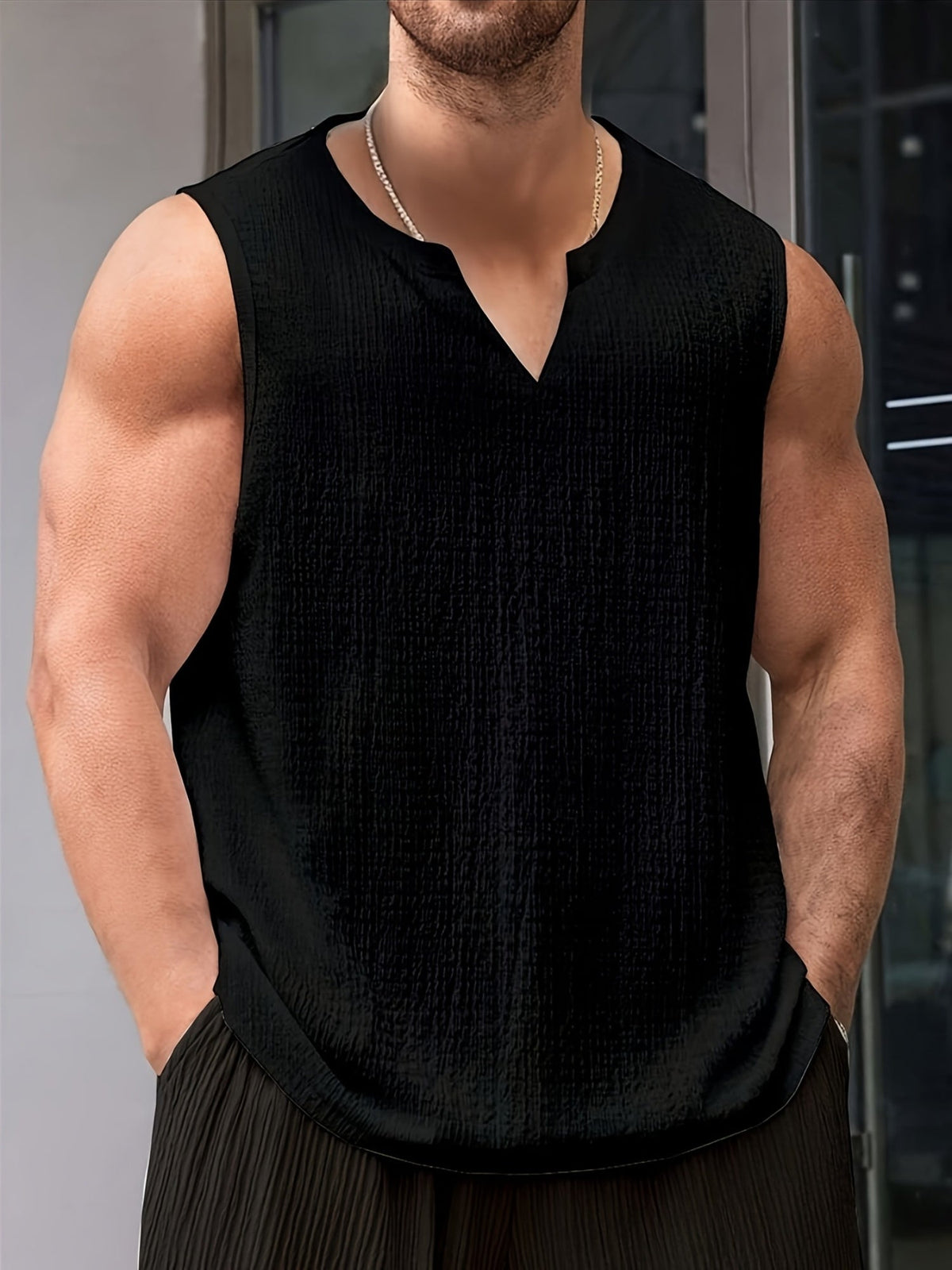 Kessoro men's relaxed notch-neck sleeveless tank top in apricot, black and white