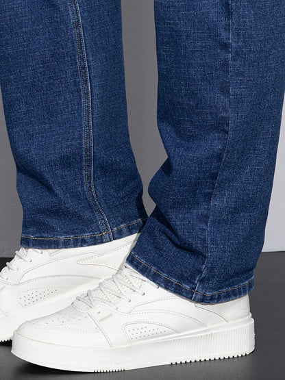 Men's mid-rise straight-leg stretch jeans in blue and black denim, colour option 1 detail view