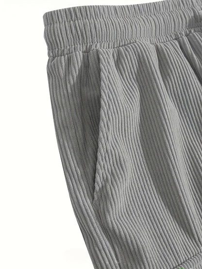 Men's textured drawstring cargo shorts in black, apricot and grey, view 10