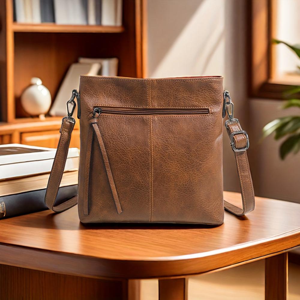 Kessoro women's casual zipper vegan leather sling bag in brown
