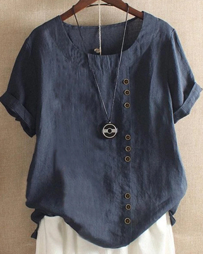 Women's asymmetrical button detail lightweight summer blouse in nine colourways, shown for womenswear styling