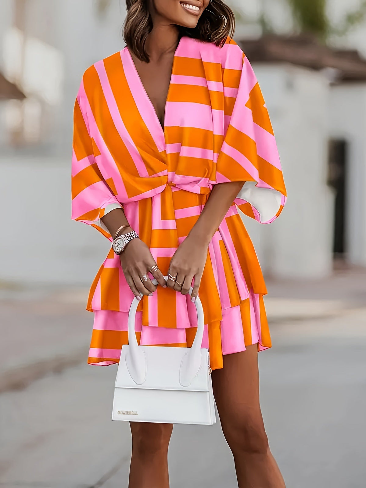Kessoro women's batwing-sleeve tiered wrap dress shown in orange red and black colourways on a female model
