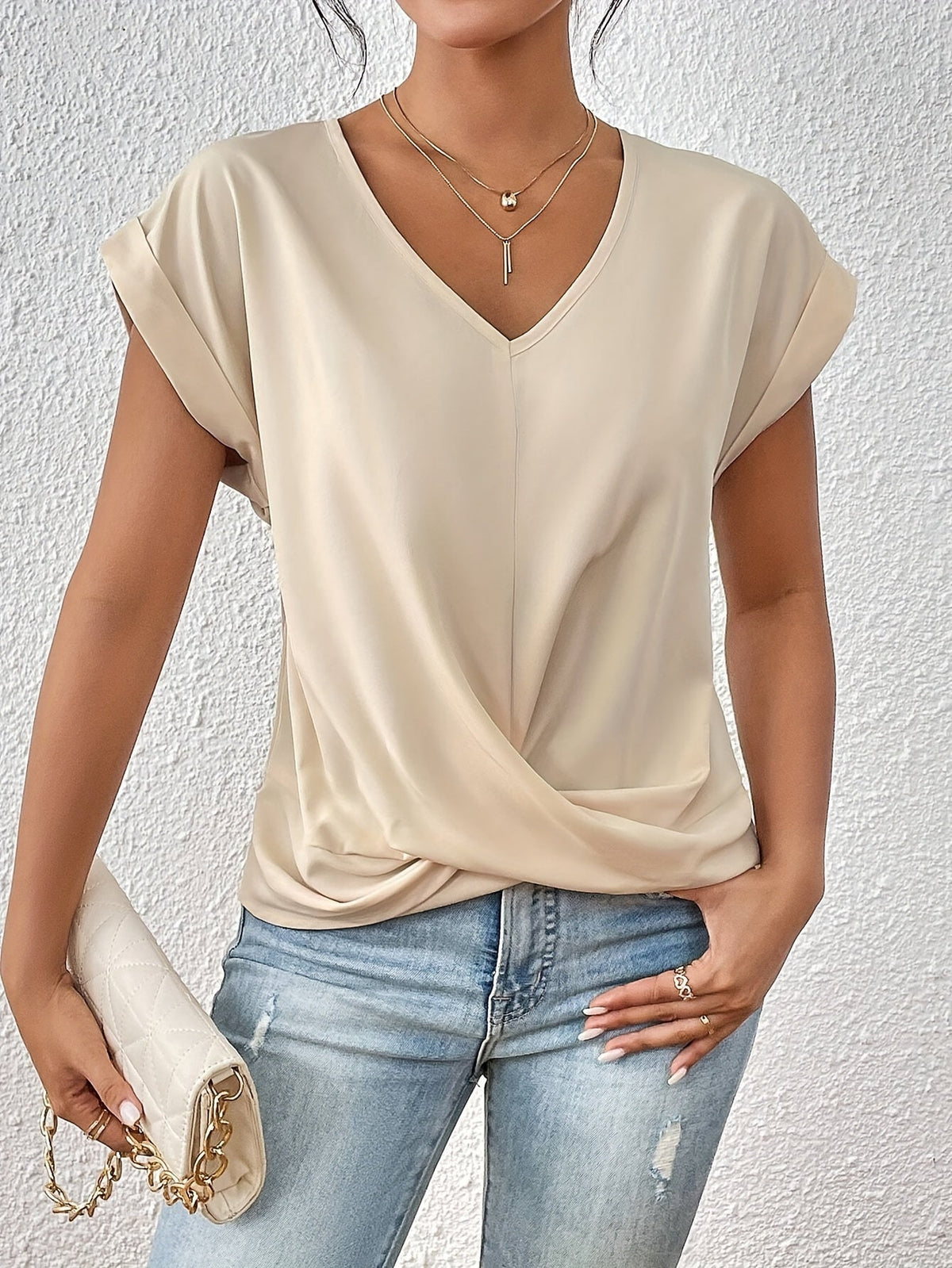 Women's twist-front V-neck top with waist-defining detail