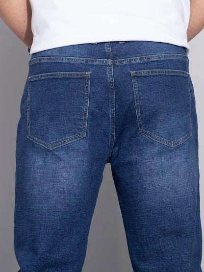 Men's mid-rise straight-leg stretch jeans in blue and black denim, close-up view