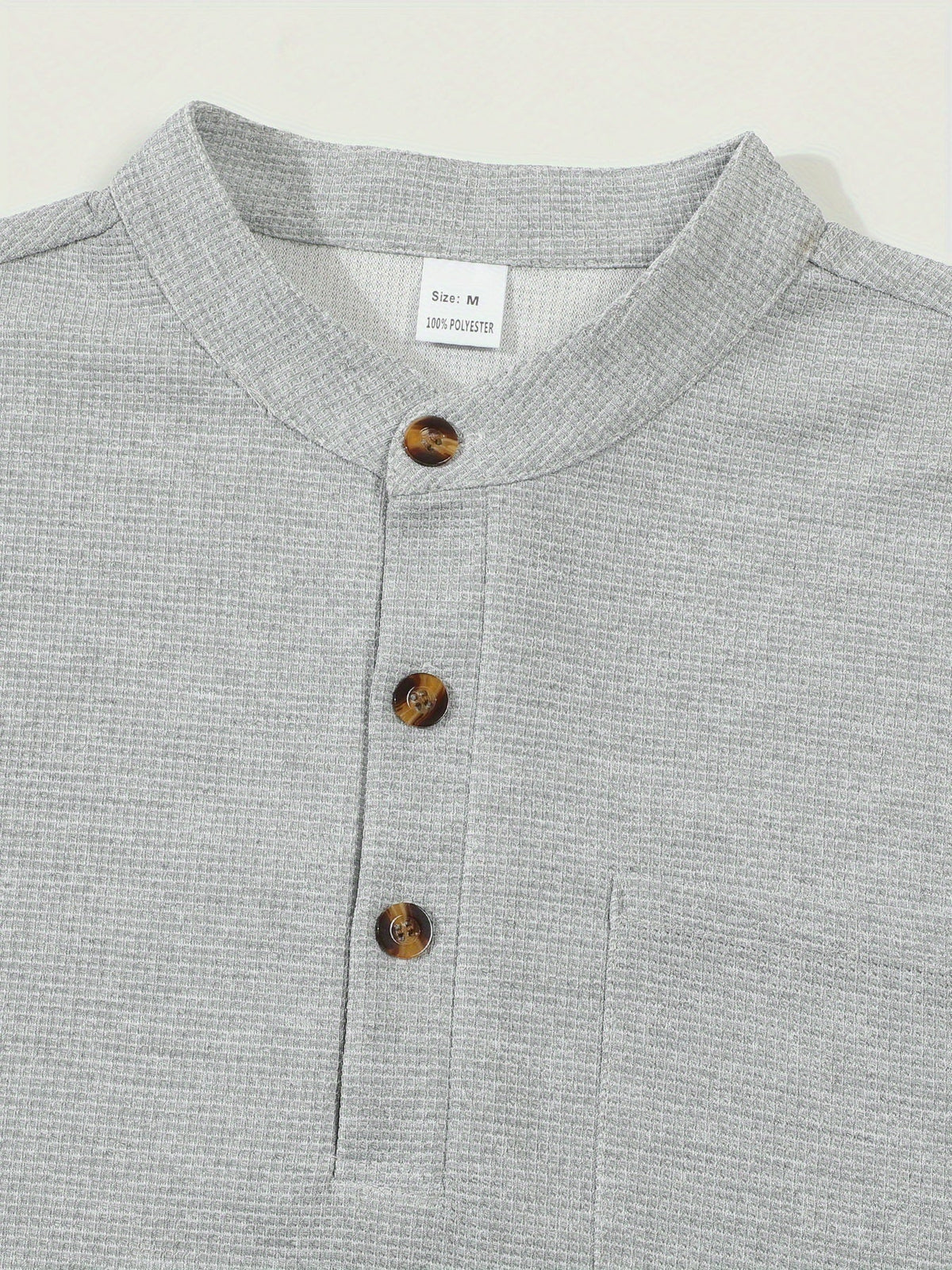 Men's textured long sleeve henley shirt in khaki, white, black, grey and burgundy, colour option 2 close-up view