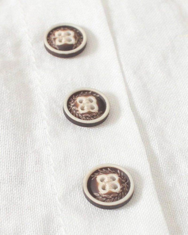Women's asymmetrical button detail lightweight summer blouse in nine colourways, shown for womenswear styling