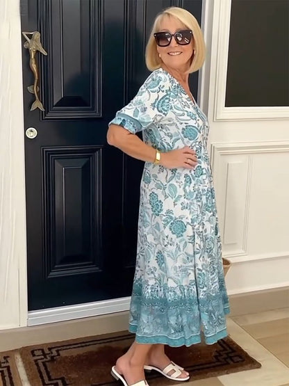 Women's graceful V-neck floral print dress in blue, brown, pink, violet and green