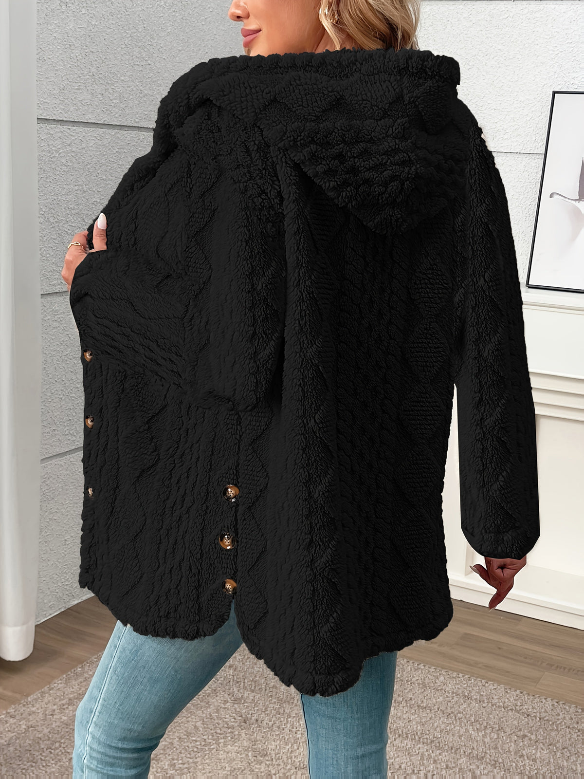 Women's textured plush button-front coat in black, side view