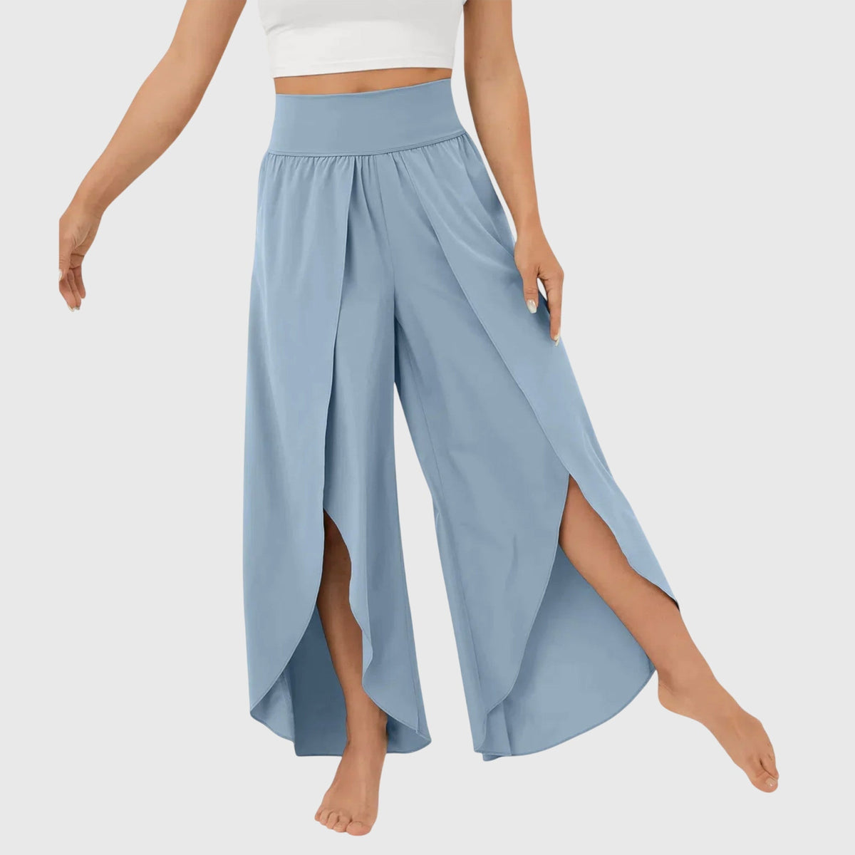 Women's high-waist flowing wide-leg split pants in a soft pastel and neutral colour family (view 1)