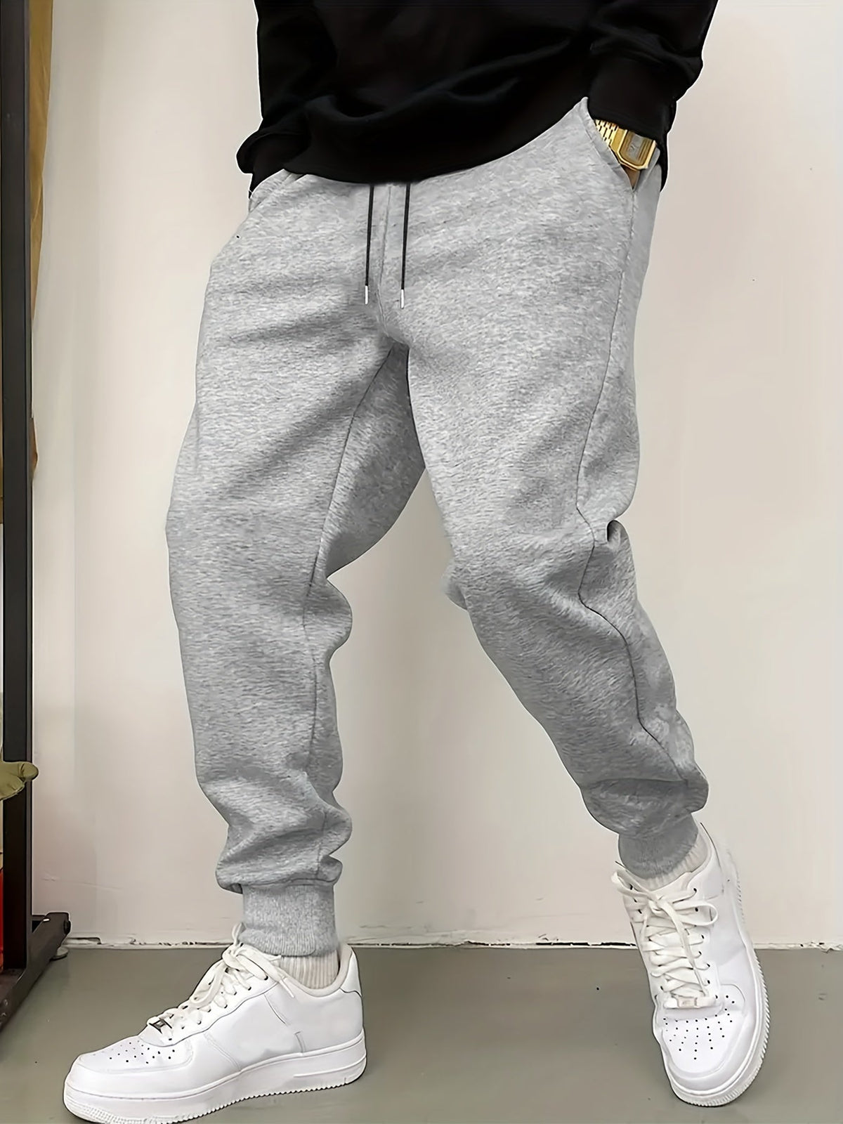Kessoro unisex relaxed tapered drawstring joggers in black or grey with side pockets