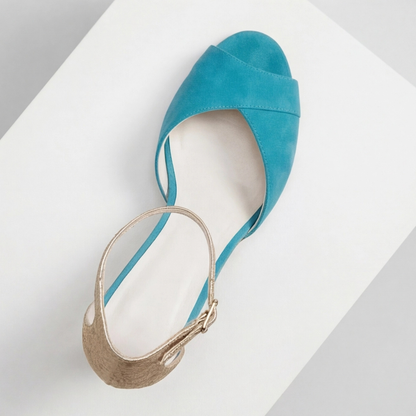 Women's teal suede strap heels with gold accents