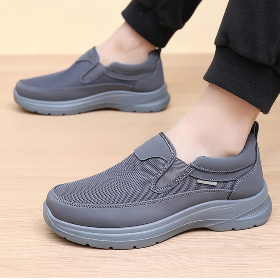 Kessoro unisex slip-on cushioned comfort sneakers in black and grey, laceless everyday shoes