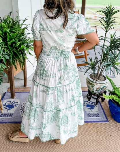 Women's toile print tiered maxi dress with a smocked waist and soft V-neckline