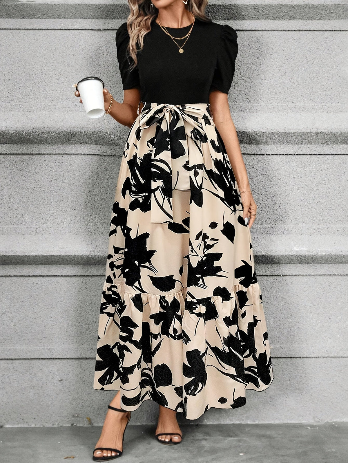 Kessoro women's printed tiered maxi dress shown in a green and black colourway on a female model