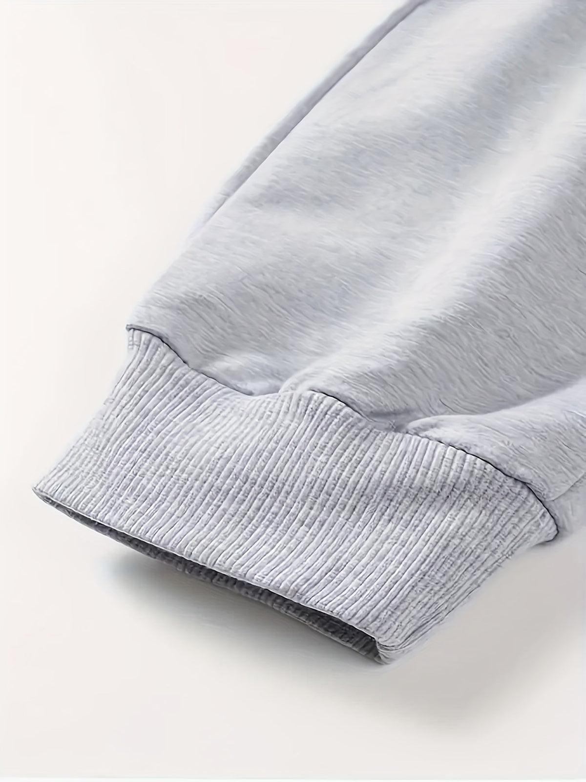 Kessoro unisex relaxed tapered drawstring joggers in black or grey with side pockets