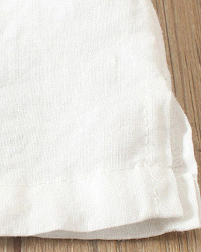 Women's asymmetrical button detail lightweight summer blouse in nine colourways, shown for womenswear styling