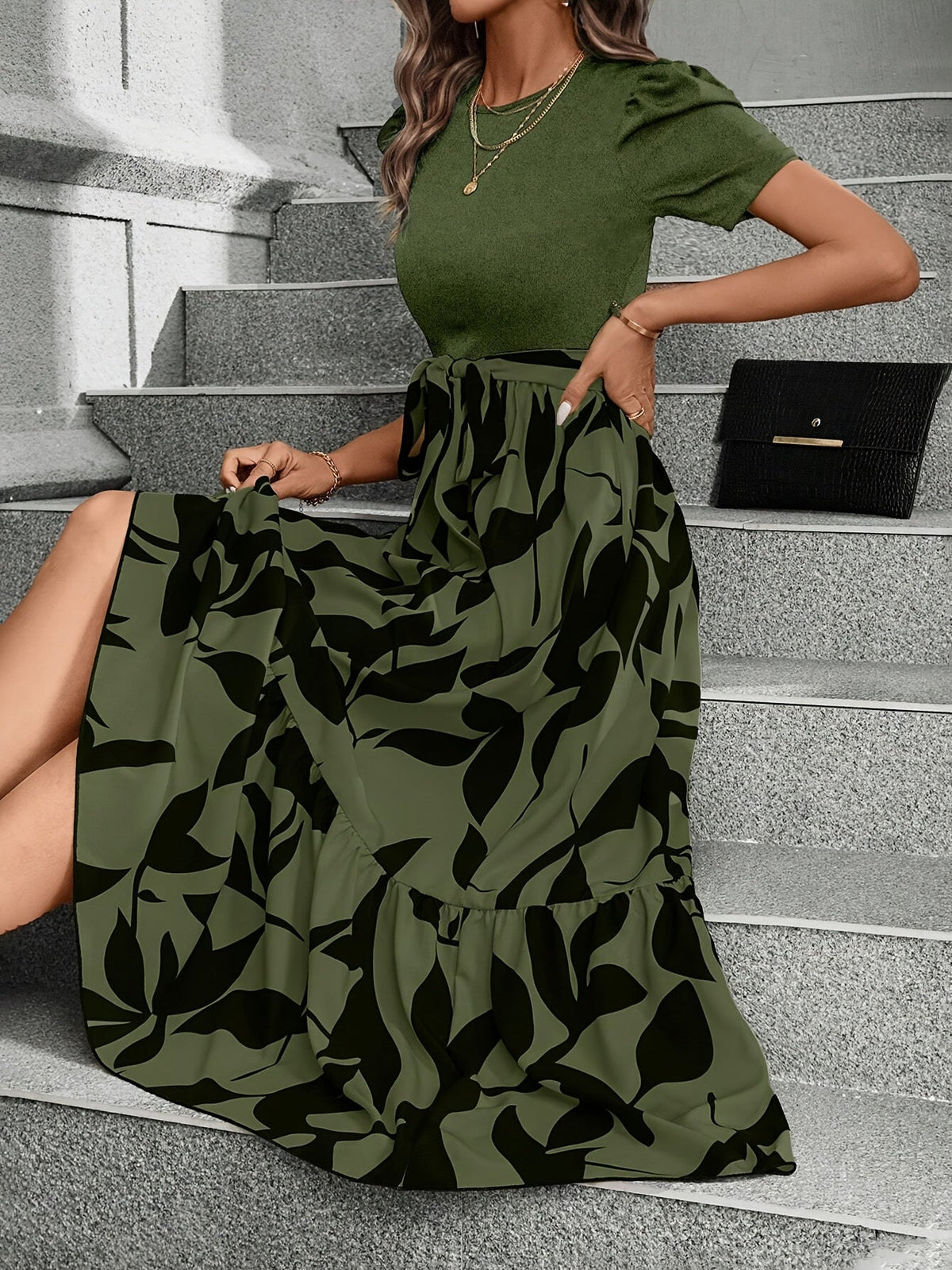 Kessoro women's printed tiered maxi dress shown in a green and black colourway on a female model