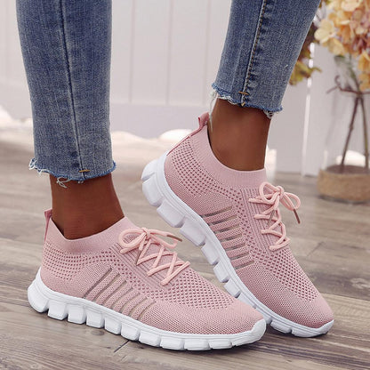 Kessoro Women's Lightweight Cushioned Everyday Sneakers in turquoise, pink, red and other colourways — styled on model