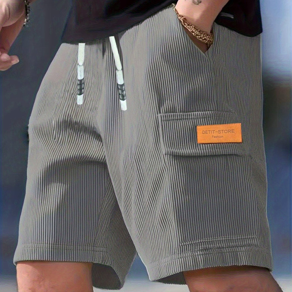 Men's textured drawstring cargo shorts in black, apricot and grey, view 13