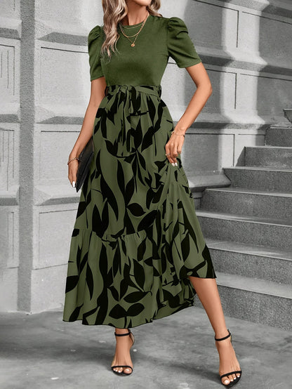 Kessoro women's printed tiered maxi dress shown in a green and black colourway on a female model