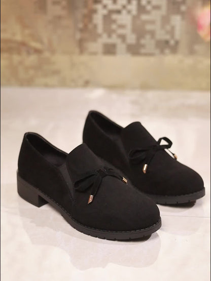 Women's bow-detail low-heel slip-on loafers in a green and black colour family (view 10)