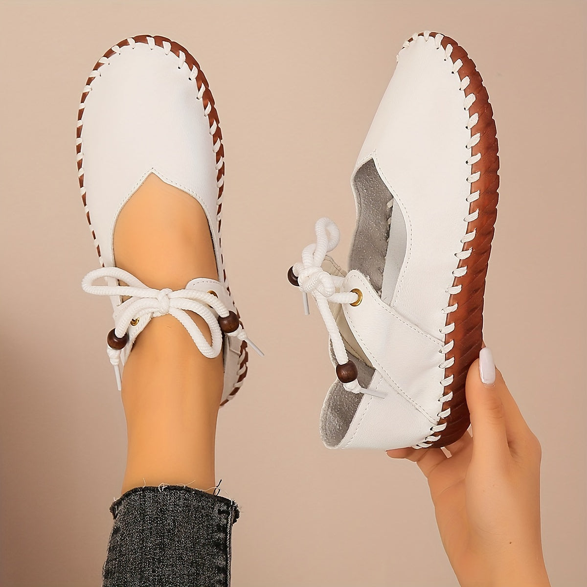 Kessoro Women's handcrafted cushioned lace-up flats in white and black, view 11