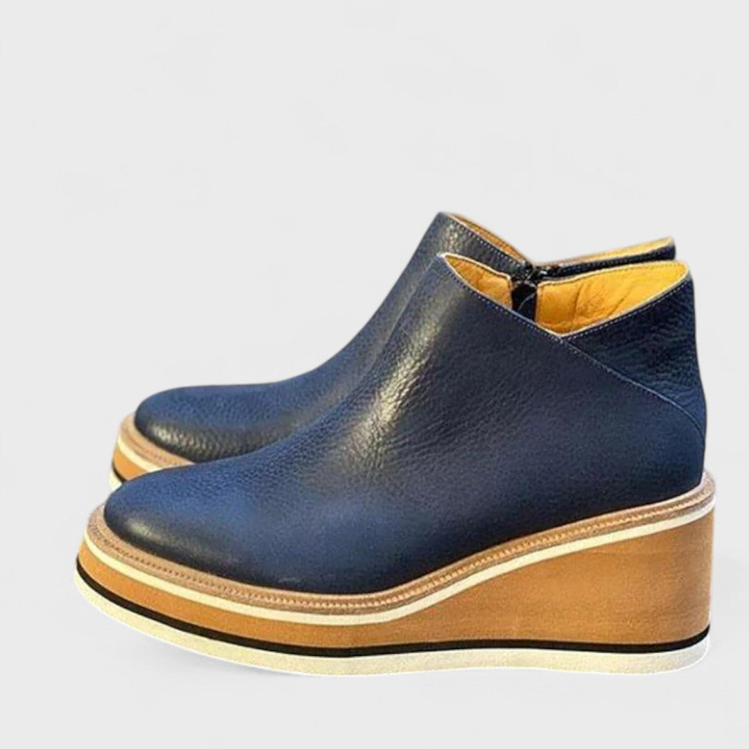 Women's waterproof side-zip ankle boots with a sleek silhouette