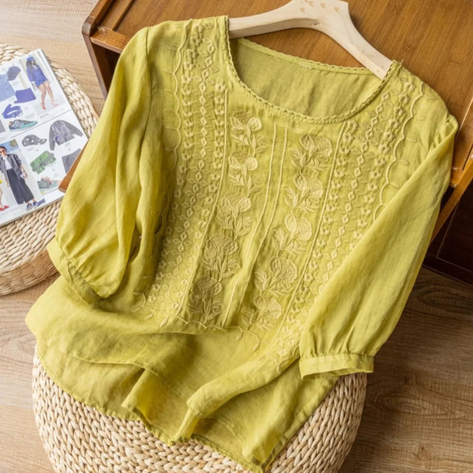 Kessoro Women's Floral Embroidered Lightweight Summer Blouse in apricot, lemon, white and lavender — detail of the fabric and finish