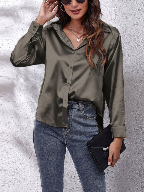 Women's elegant collared long-sleeve blouse in a solid seasonal colourway