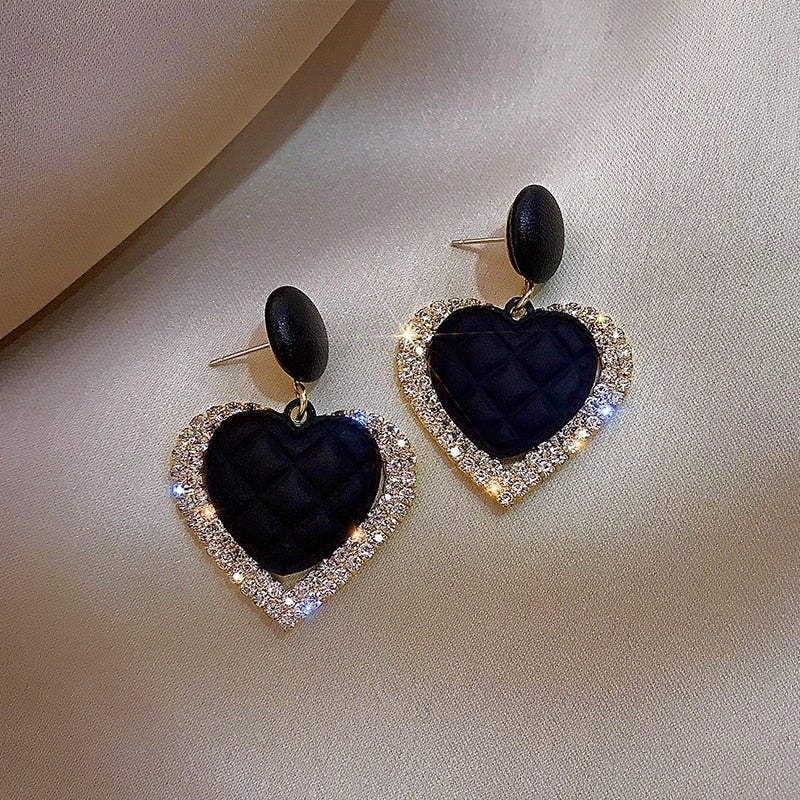Kessoro women's black and gold heart-shaped statement earrings