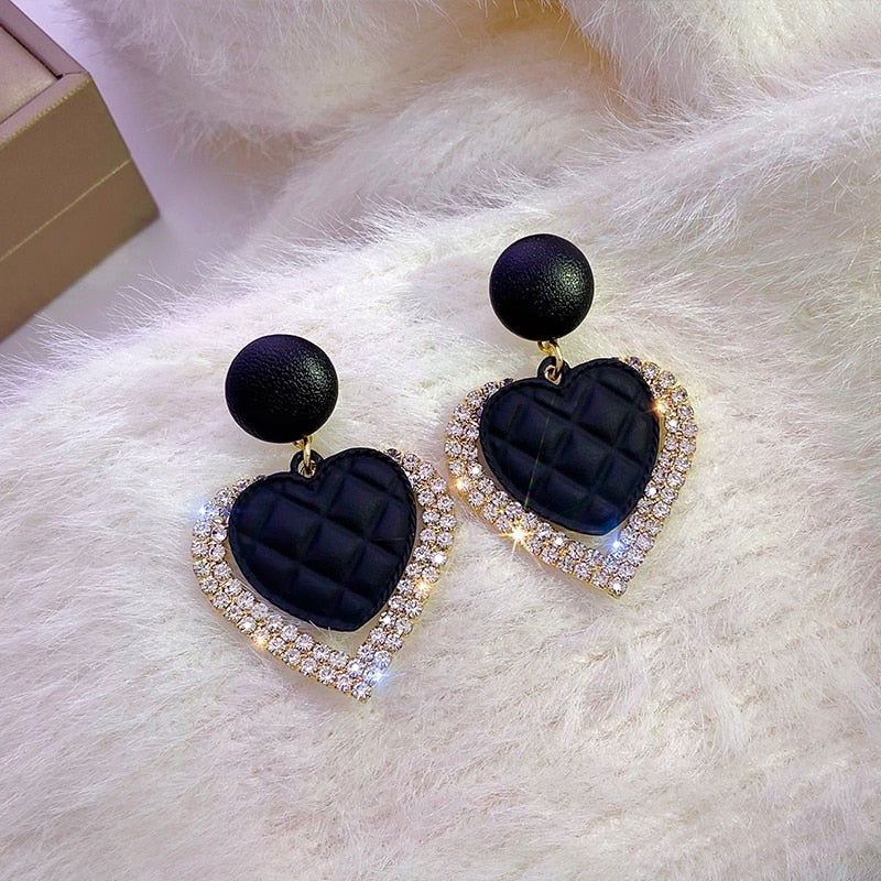 Kessoro women's black and gold heart-shaped statement earrings