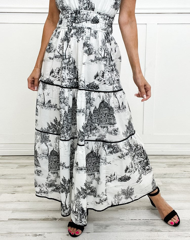 Women's toile print tiered maxi dress with a smocked waist and soft V-neckline