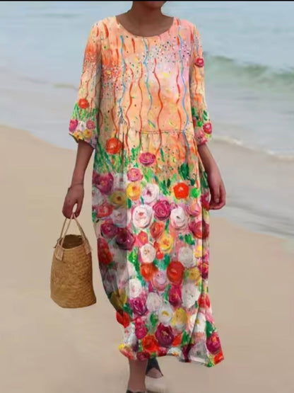 Women's floral print knee length dress with a round neck and short sleeves in blue and pink