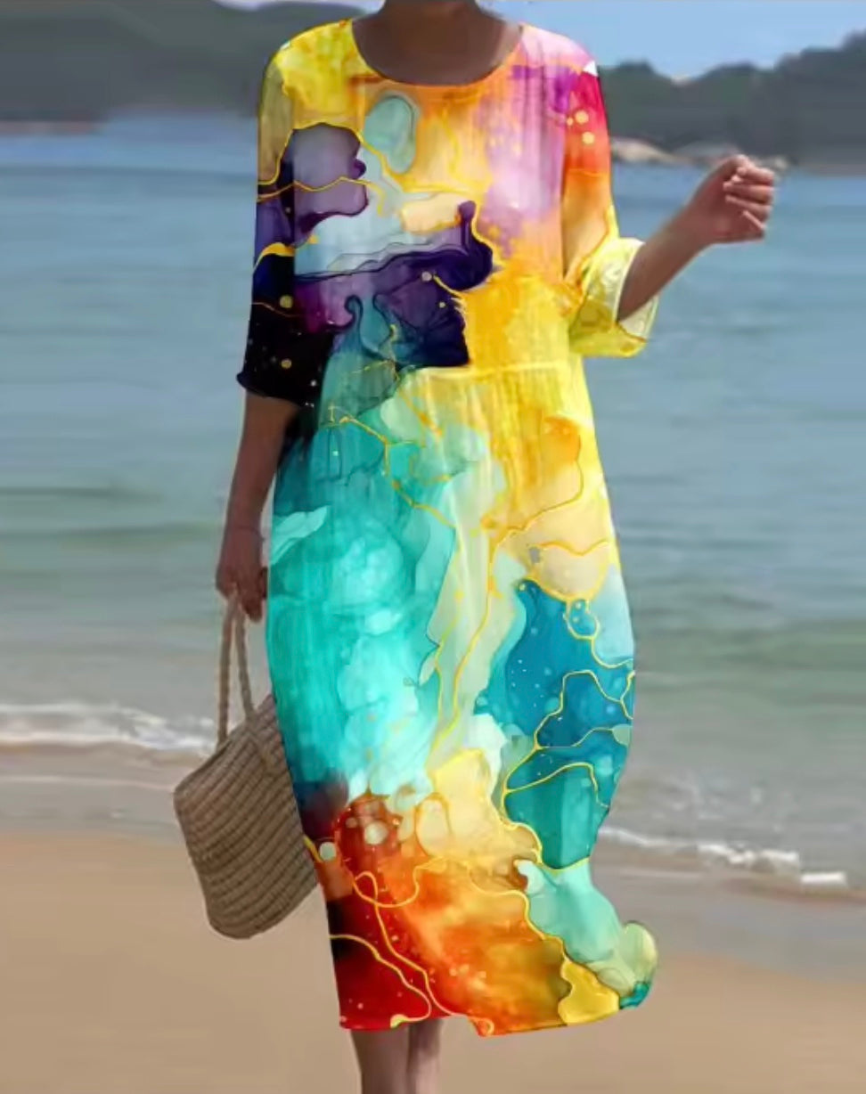 Women's floral print knee length dress with a round neck and short sleeves in blue and pink